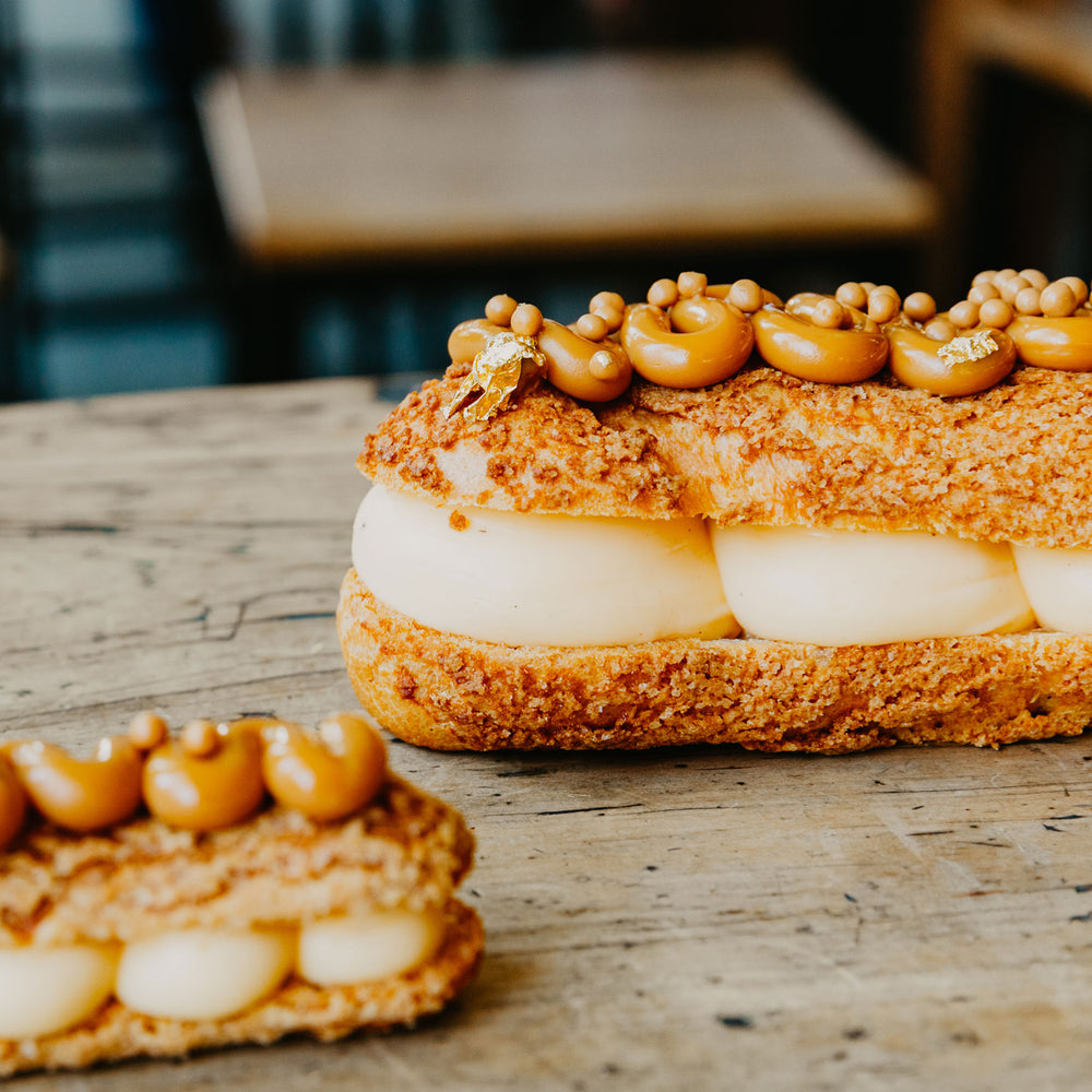 
            
                Load image into Gallery viewer, Giant Salted Caramel Eclair Bam Bam Bakehouse
            
        
